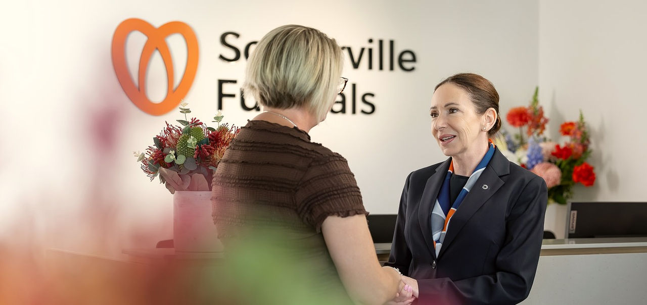 funeral director with woman