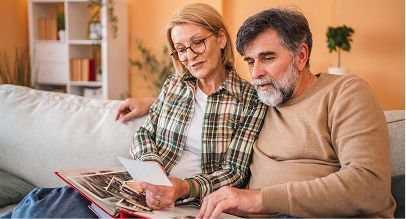 couple looking at photo album