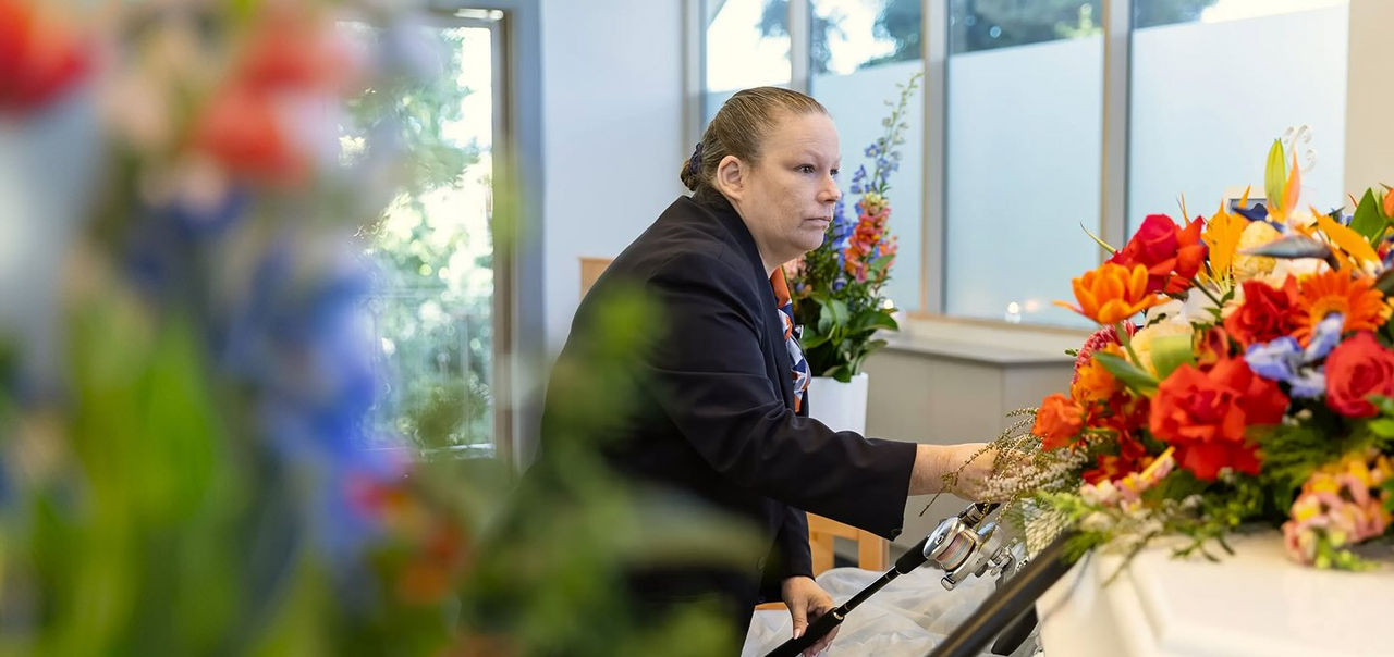 Somerville funeral director arranging a coffin
