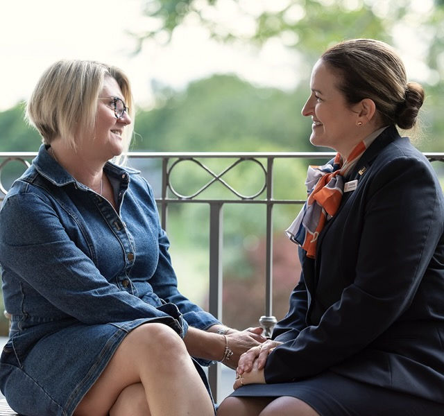 funeral director and woman