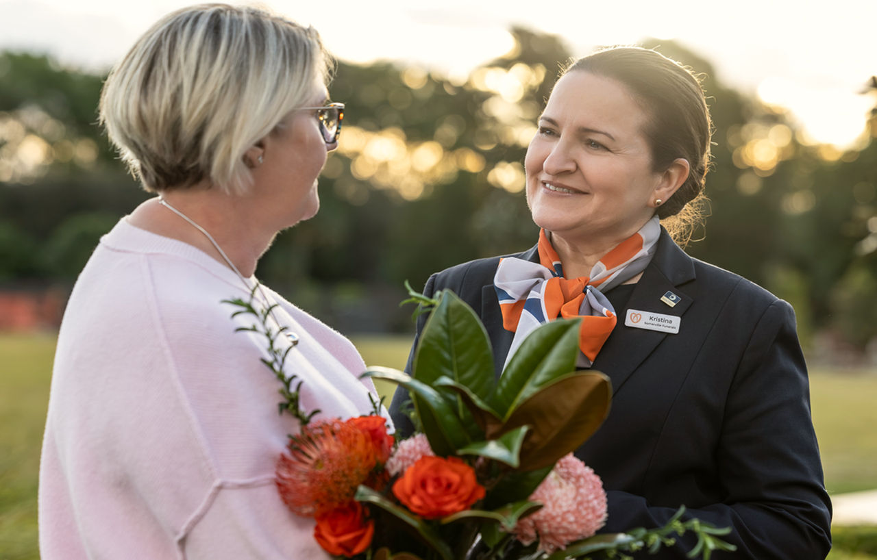 funeral director with local woman